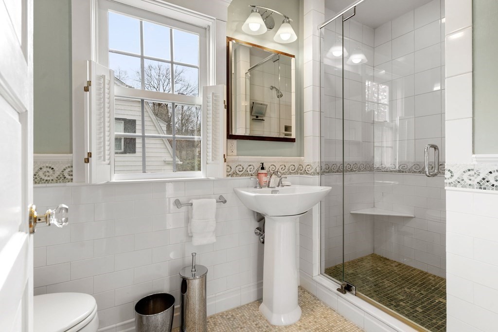 22 Ardmore Road Newton, MA 02465 - Photo 11 of 18 a bathroom with a sink toilet and shower