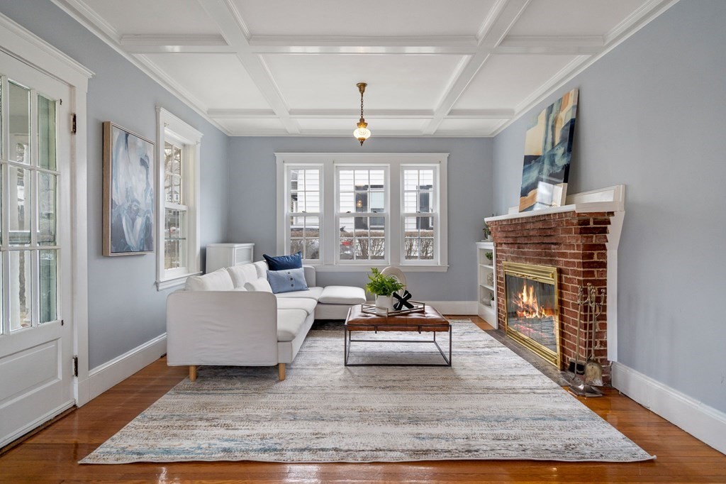 22 Ardmore Road Newton, MA 02465 - Photo 3 of 18 a living room with furniture fireplace and window