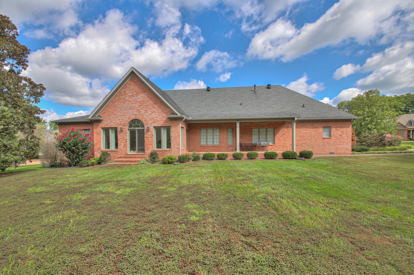 521 Robards Circle Old Hickory, TN 37138 - Photo 14 of 50 a view of a yard in front of a house with plants and large tree