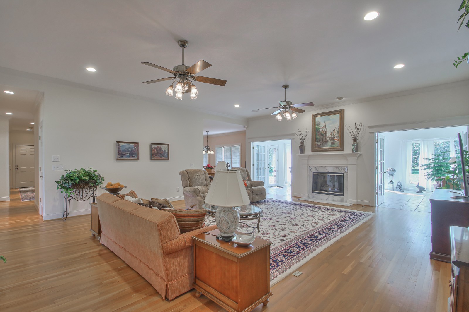 521 Robards Circle Old Hickory, TN 37138 - Photo 23 of 50 a living room with fireplace furniture and a chandelier