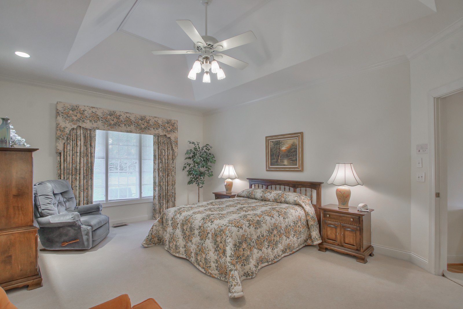 521 Robards Circle Old Hickory, TN 37138 - Photo 35 of 50 a bedroom with a bed and a chandelier