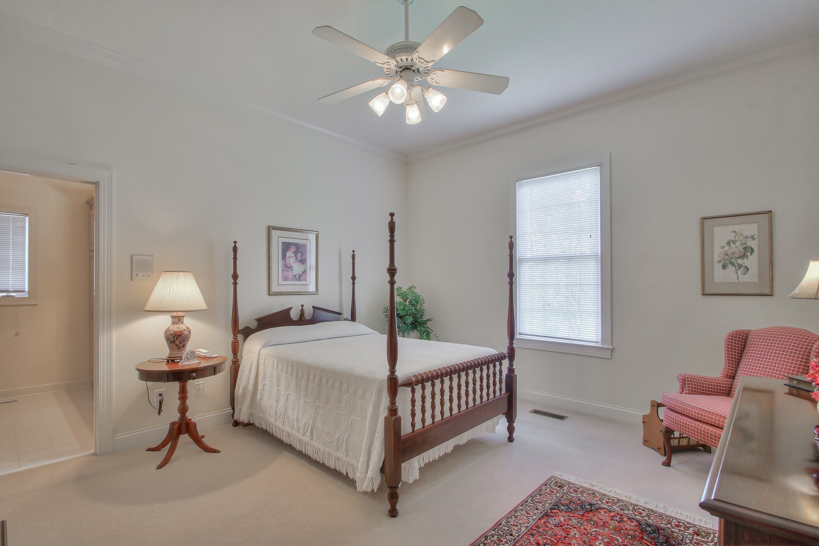 521 Robards Circle Old Hickory, TN 37138 - Photo 42 of 50 a bedroom with a bed and a chandelier