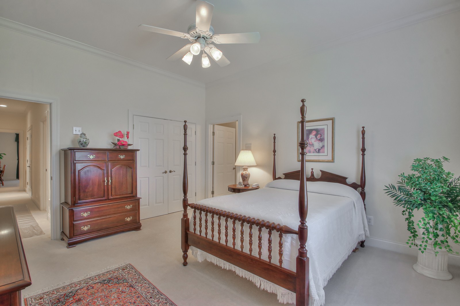 521 Robards Circle Old Hickory, TN 37138 - Photo 43 of 50 a bedroom with a bed and a chandelier