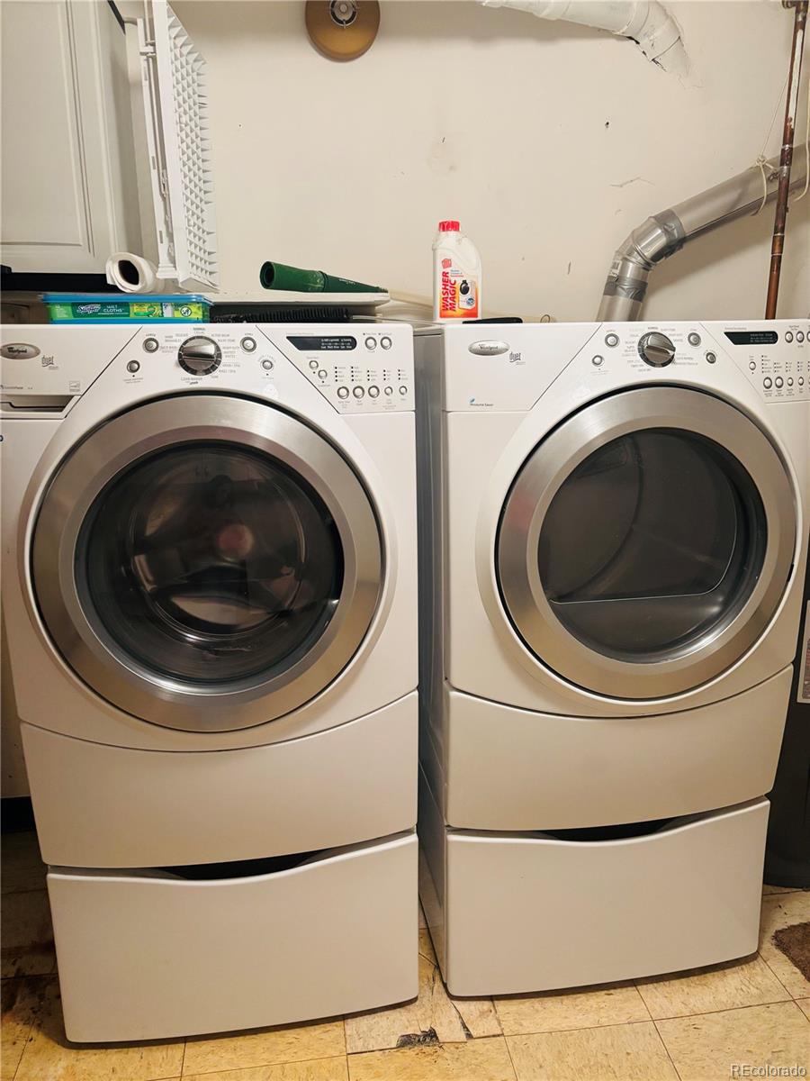 503 Elm Street Fort Morgan, CO 80701 - Photo 25 of 26 a utility room with dryer and washer