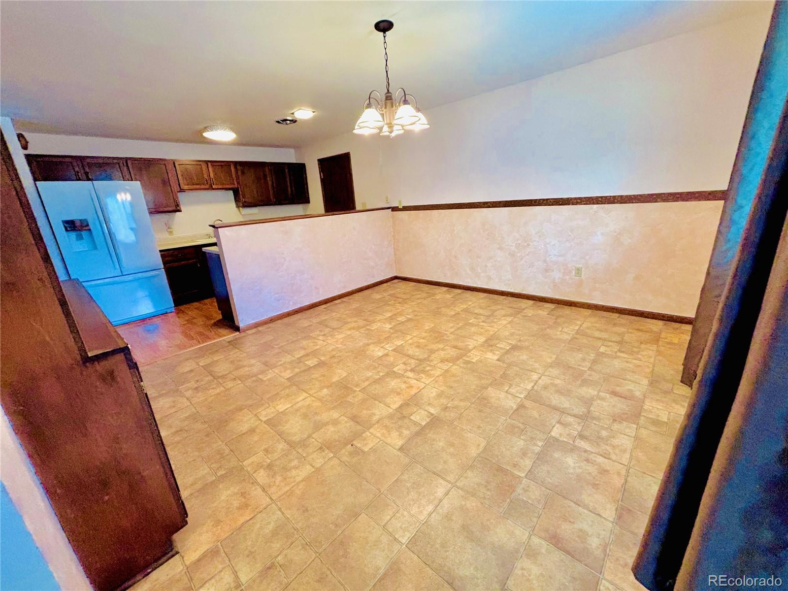 503 Elm Street Fort Morgan, CO 80701 - Photo 7 of 26 a view of a kitchen with a sink