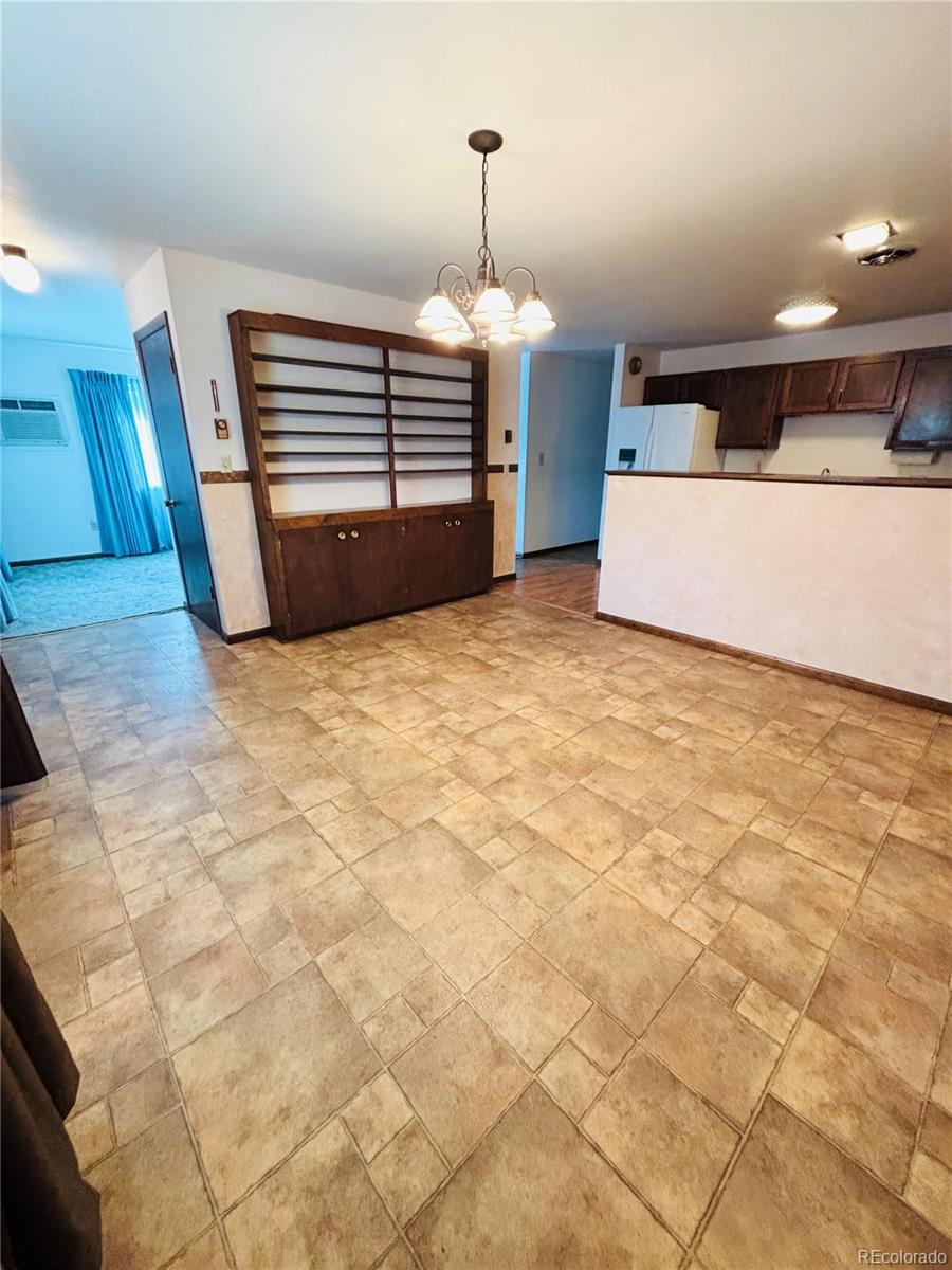 503 Elm Street Fort Morgan, CO 80701 - Photo 8 of 26 a view of a livingroom with furniture