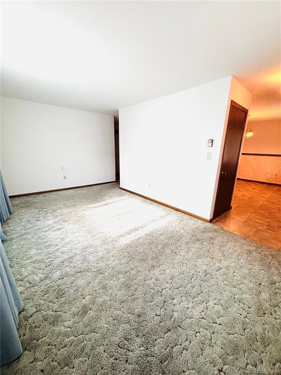 503 Elm Street Fort Morgan, CO 80701 - Photo 10 of 26 a view of an empty room