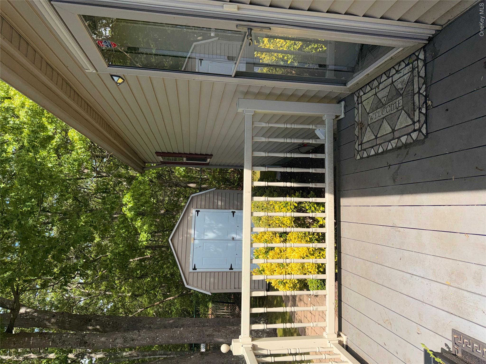 1661 Old Country Road, Unit 516 Riverhead, NY 11901 - Photo 25 of 50 a view of front door