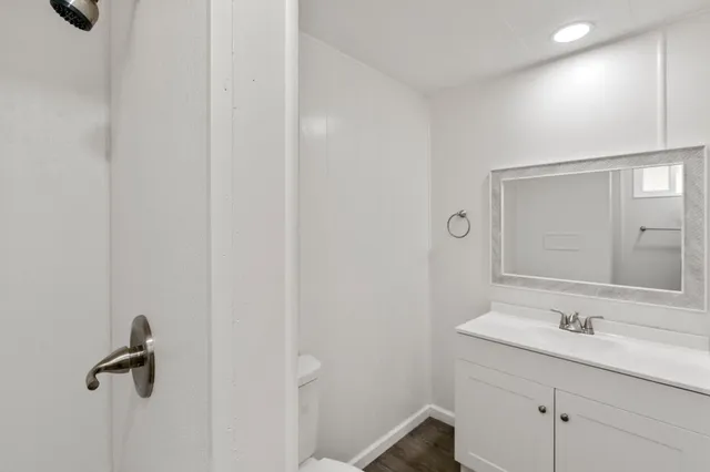 a bathroom with a sink and mirror