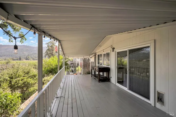 a view of living room with balcony