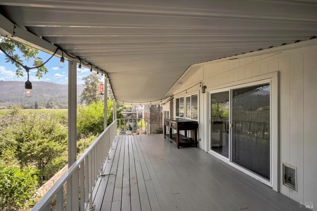 a view of living room with balcony