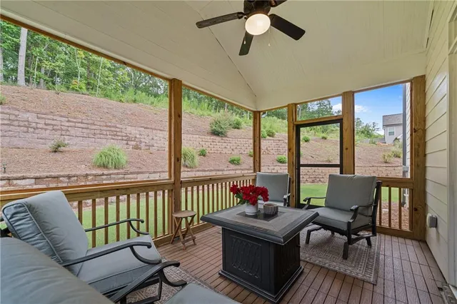 an aerial view of a house with a swimming pool