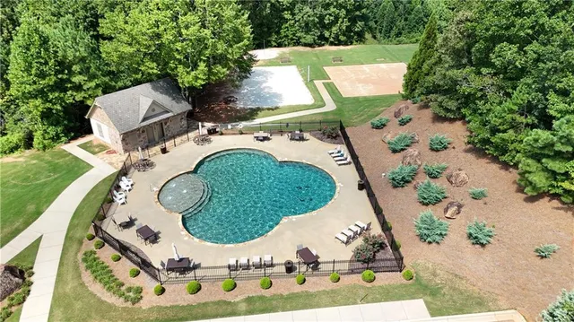 a kitchen with refrigerator a sink and cabinets