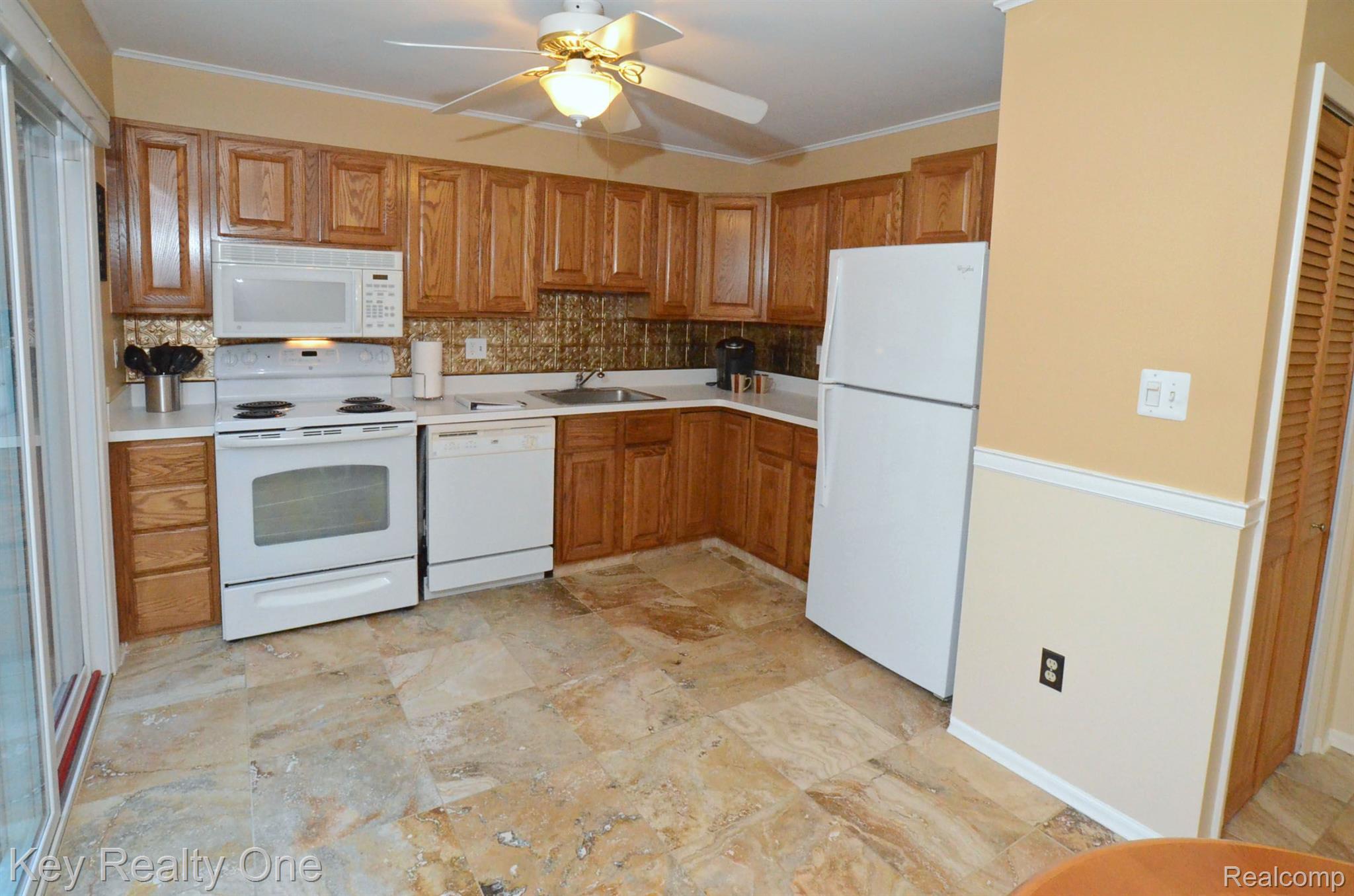 1102 Moreland Court Rochester, MI 48307 - Photo 9 of 31 Roomy Kitchen with Marble Tile