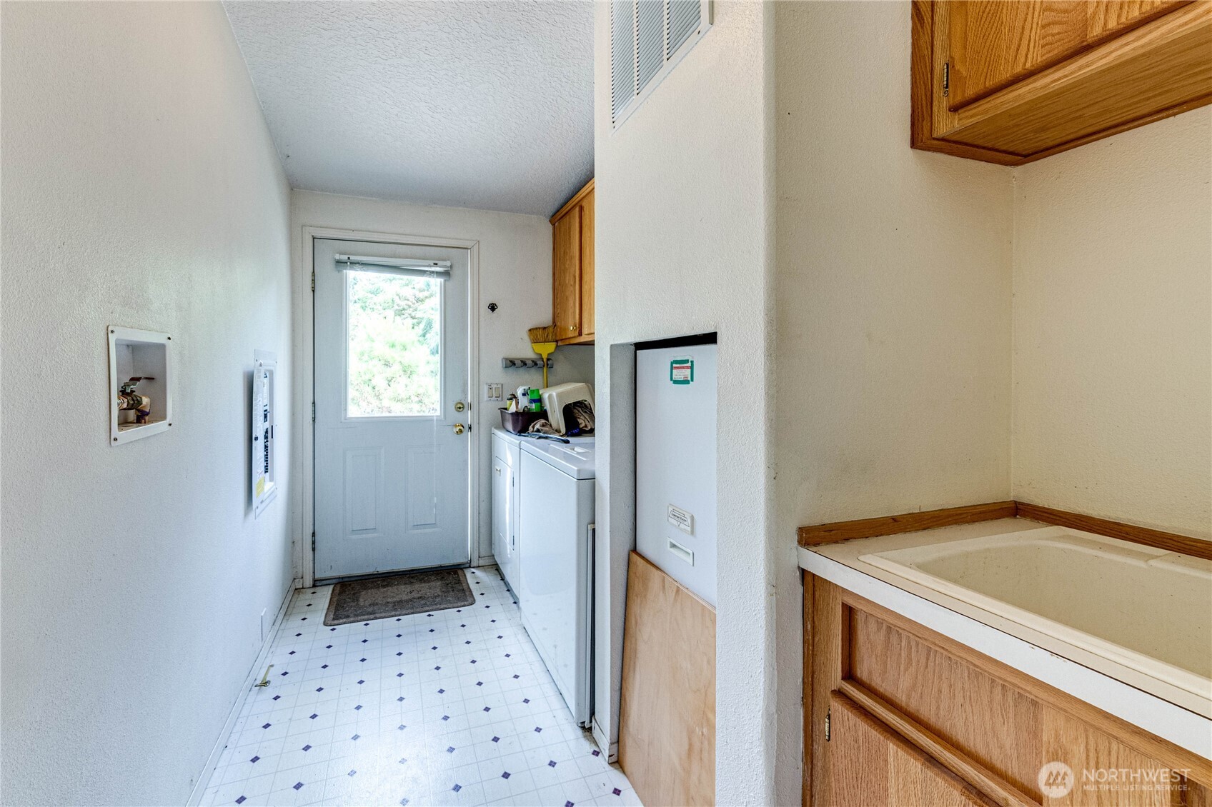 62 Johnson Road Port Angeles, WA 98363 - Photo 28 of 38 a view of a hallway and a garage
