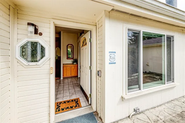 a view of a house with a door and a window