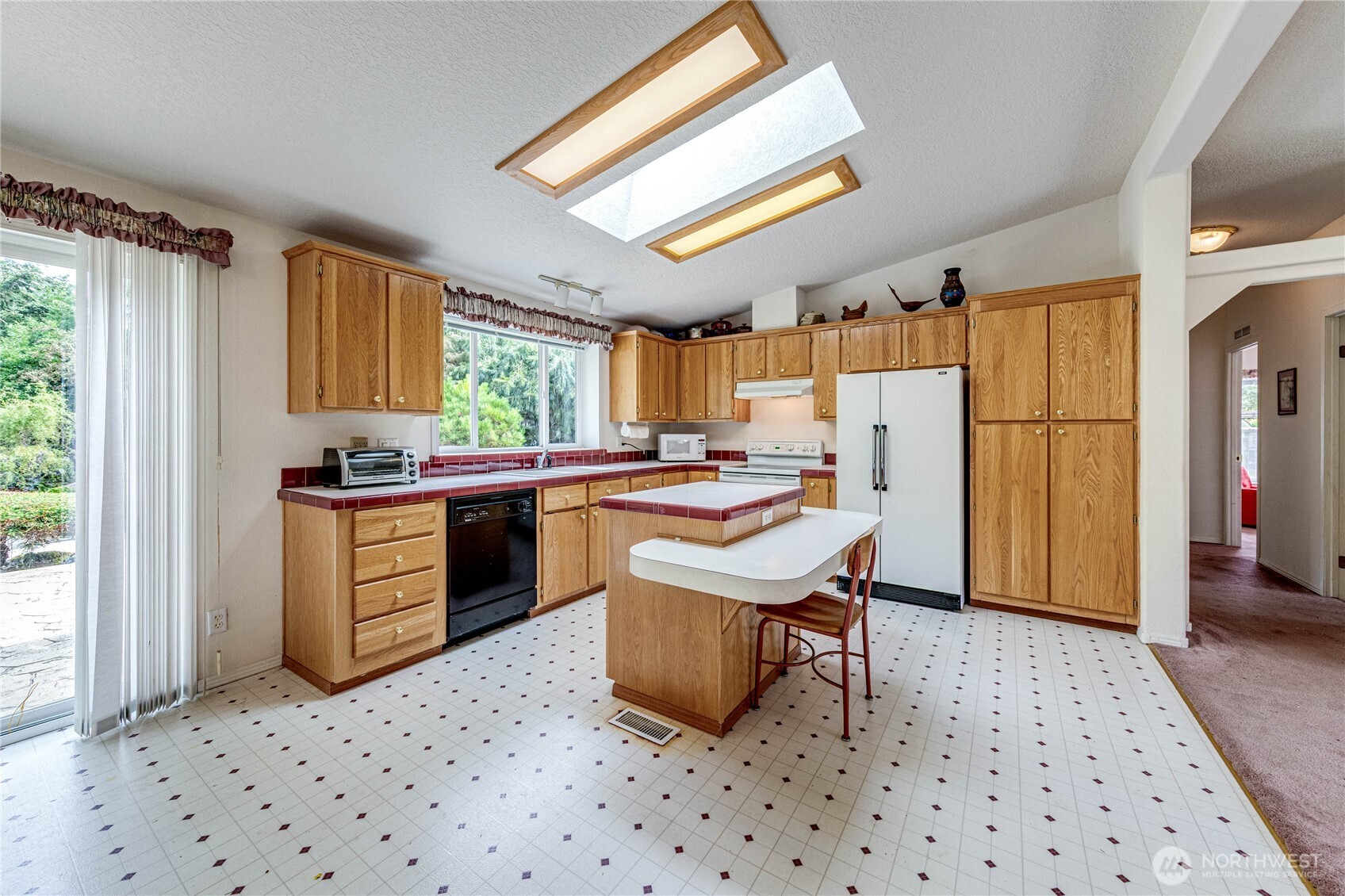 62 Johnson Road Port Angeles, WA 98363 - Photo 7 of 38 a kitchen with a sink cabinets and window