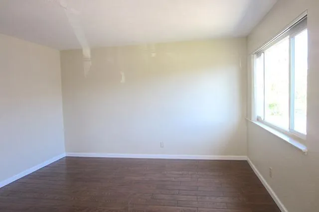 a view of an empty room and window
