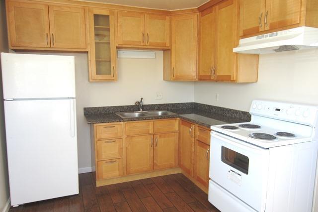 3147 Williamsburg Drive San Jose, CA 95117 - Photo 7 of 11 a kitchen with stainless steel appliances granite countertop a sink a stove a refrigerator with grey cabinets