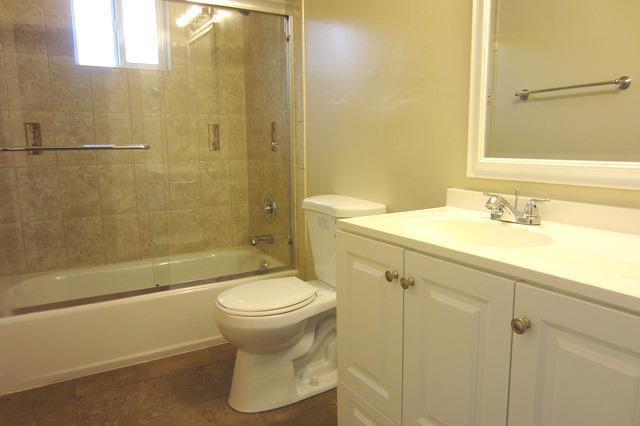 3147 Williamsburg Drive San Jose, CA 95117 - Photo 9 of 11 a bathroom with a sink toilet and shower
