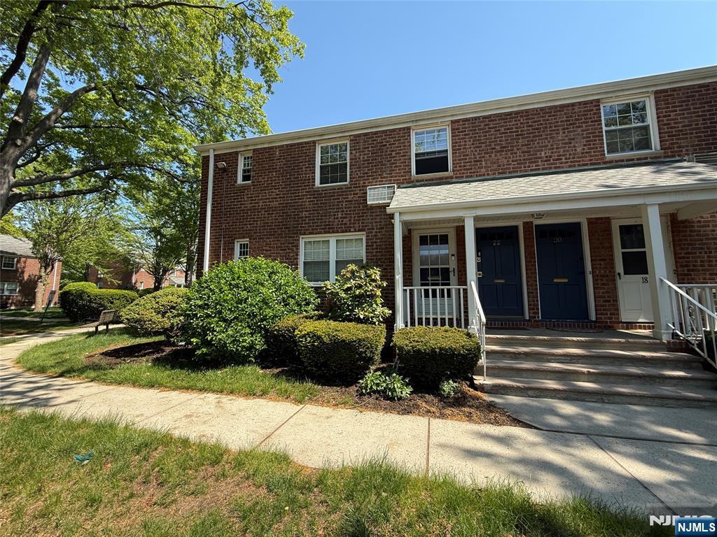 20 Clark Court Rutherford, NJ 07070 - Photo 3 of 29 a front view of a house with a yard