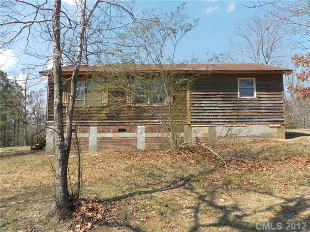 7296 Shiloh Unity Road Lancaster, SC 29720 - Photo 2 of 9 a view of a backyard of the house