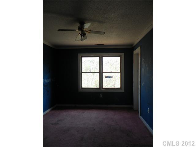 7296 Shiloh Unity Road Lancaster, SC 29720 - Photo 6 of 9 a view of a livingroom and a window