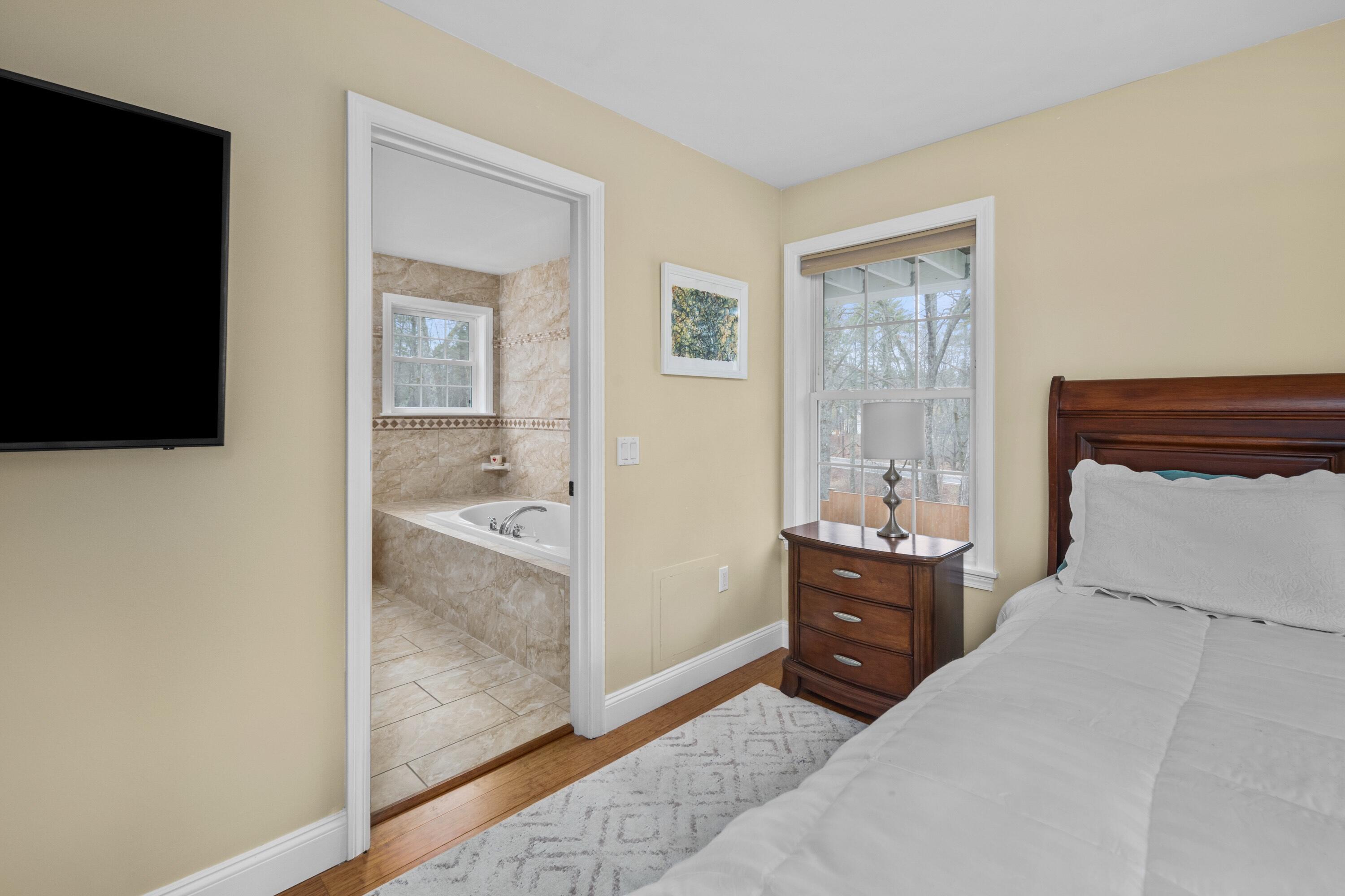 239 Cider Hill Road York, ME 03909 - Photo 17 of 43 1st Floor Primary Bedroom