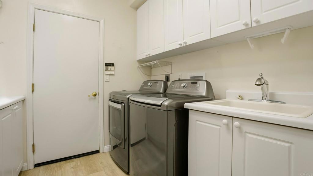 2527 Southern Oak Road Ramona, CA 92065 - Photo 34 of 56 a utility room with sink dryer and washer