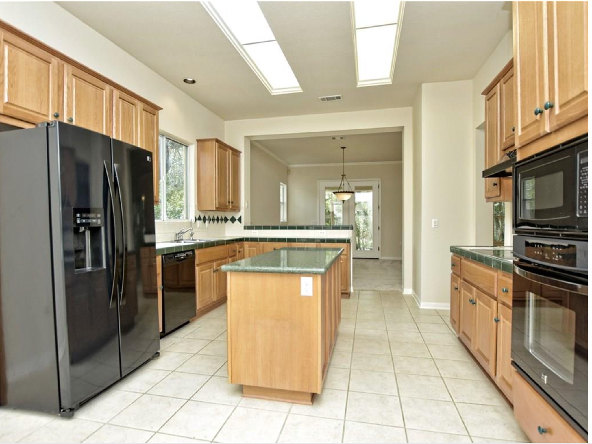 168 Dan Moody Trail Georgetown, TX 78633 - Photo 20 of 40 a kitchen with stainless steel appliances granite countertop a refrigerator and a stove