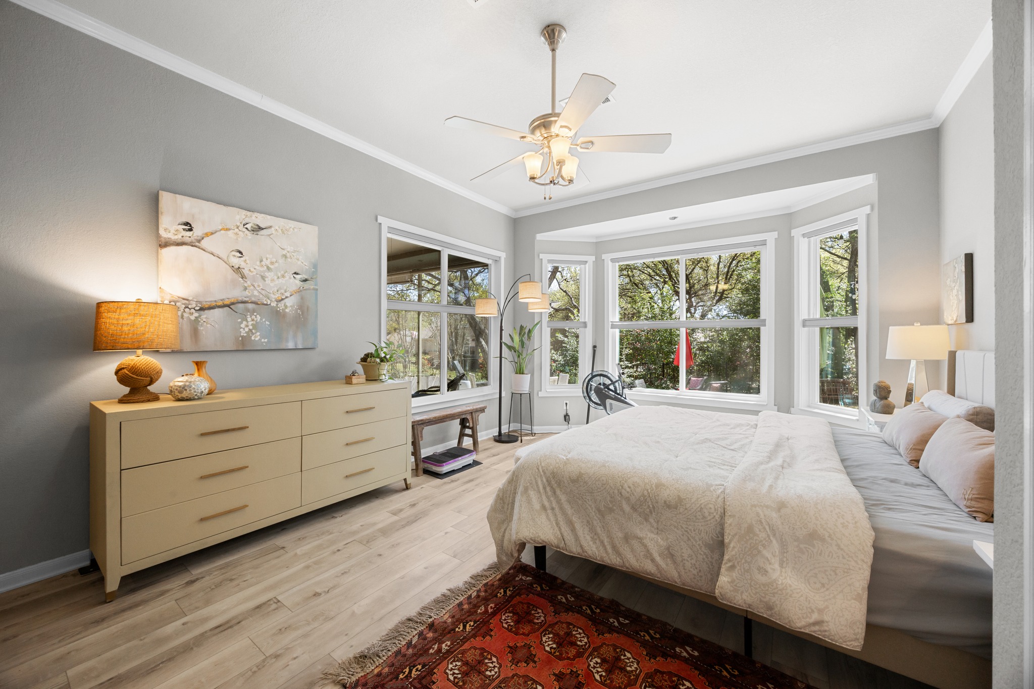 168 Dan Moody Trail Georgetown, TX 78633 - Photo 25 of 40 a spacious bedroom with a large bed and a window