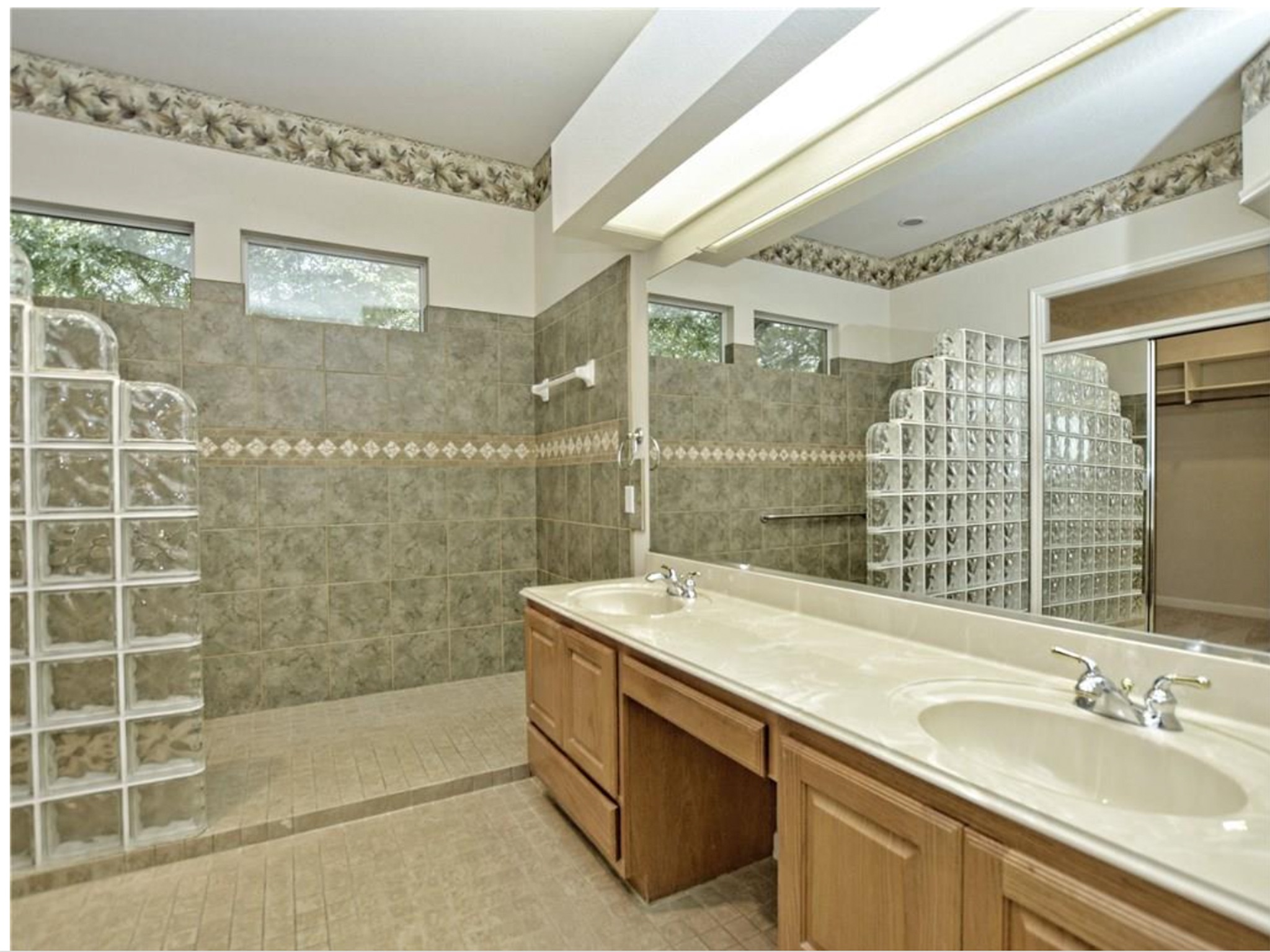 168 Dan Moody Trail Georgetown, TX 78633 - Photo 29 of 40 a bathroom with a sink mirror and shower