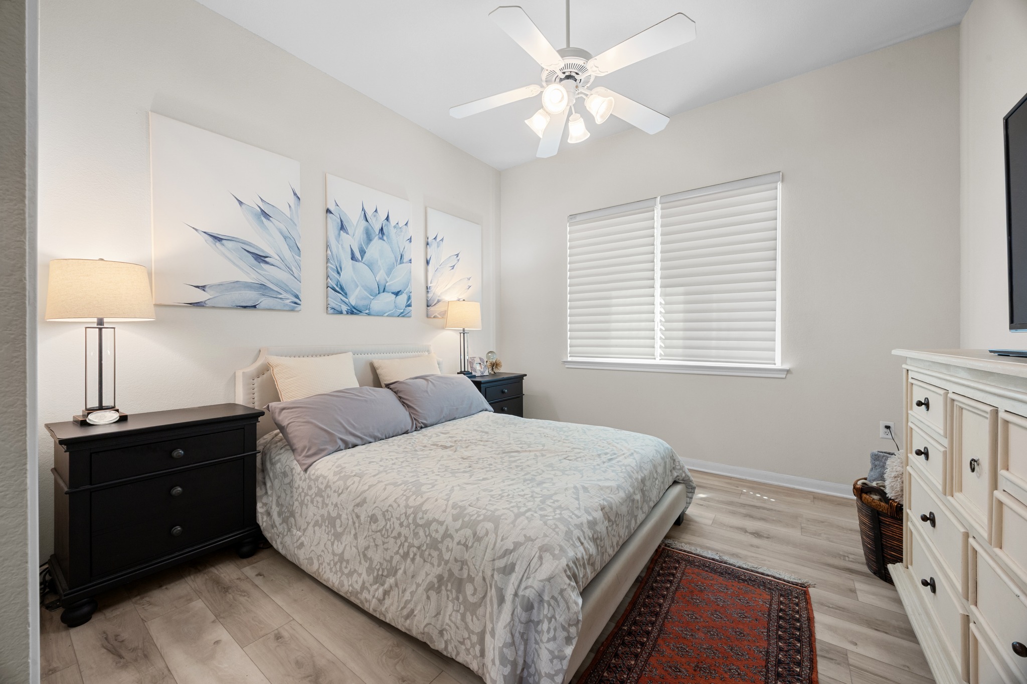 168 Dan Moody Trail Georgetown, TX 78633 - Photo 30 of 40 a bedroom with a large bed and a window