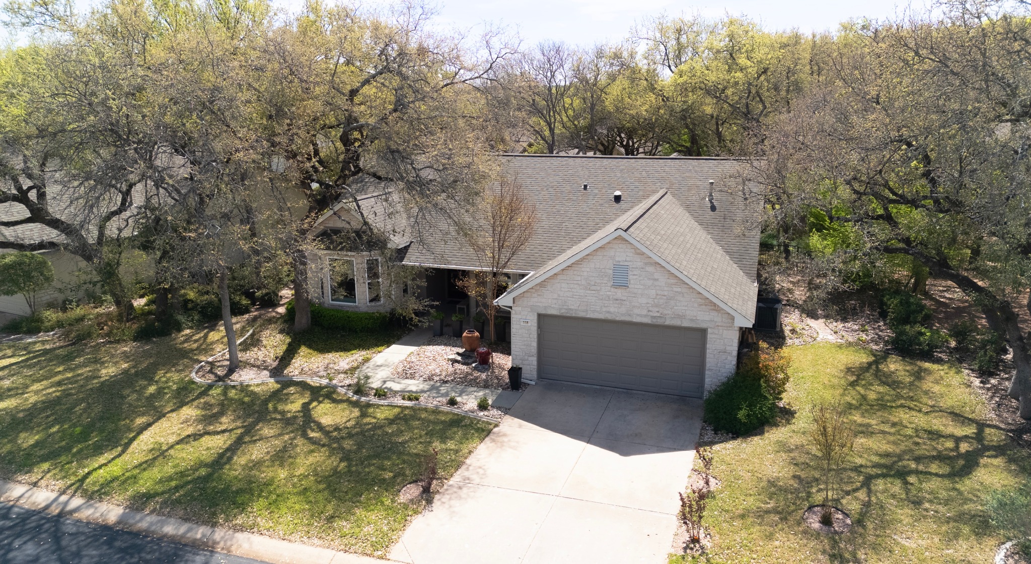 168 Dan Moody Trail Georgetown, TX 78633 - Photo 3 of 40 a view of a house with a yard