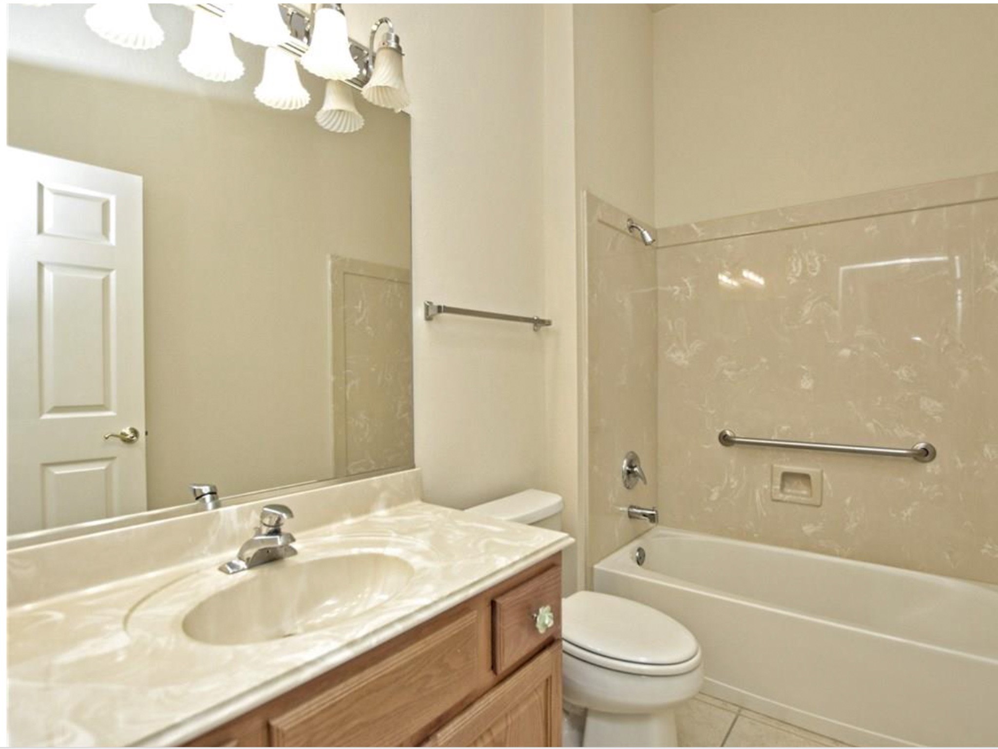 168 Dan Moody Trail Georgetown, TX 78633 - Photo 33 of 40 a bathroom with a granite countertop sink a toilet and shower