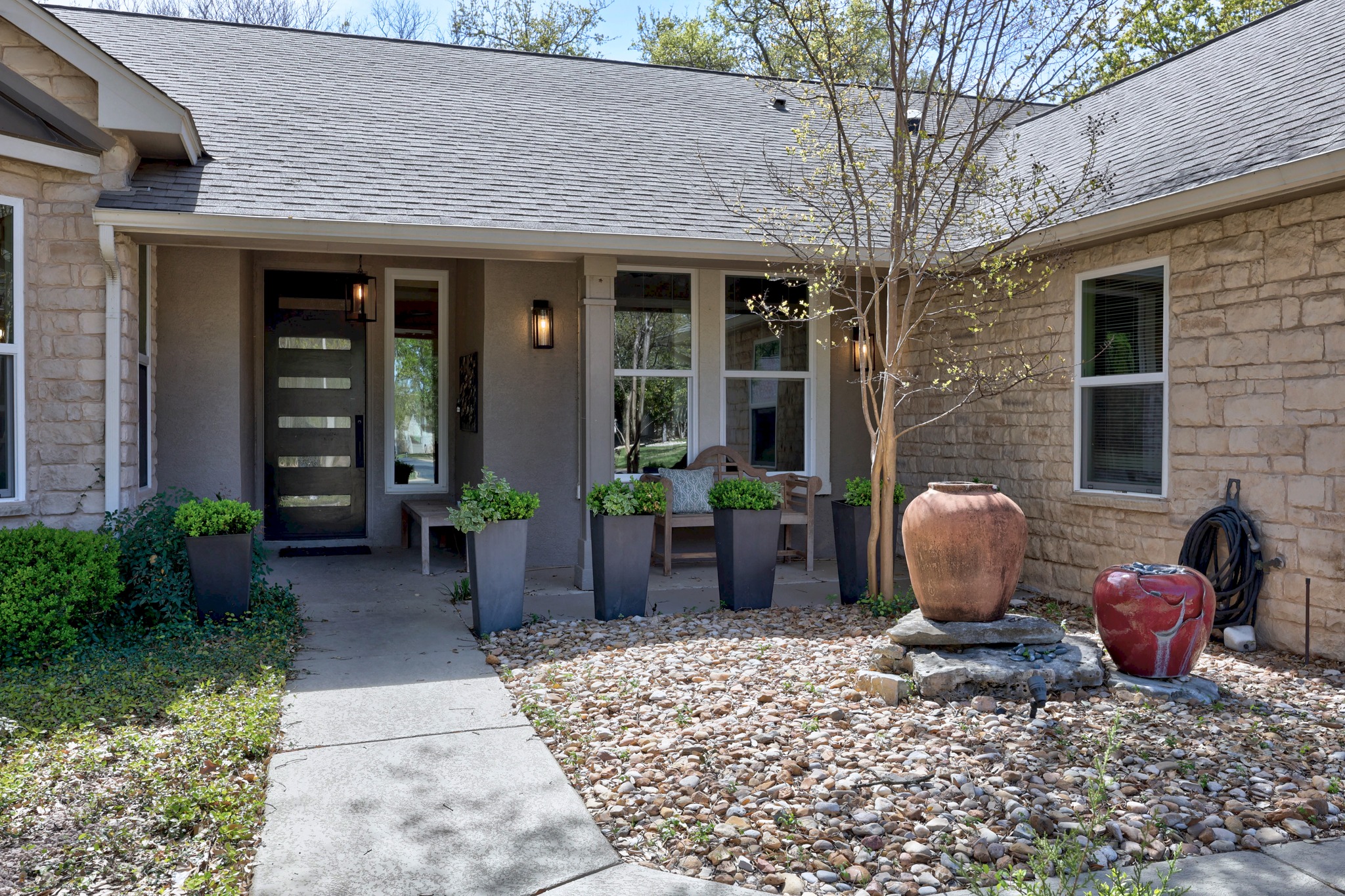 168 Dan Moody Trail Georgetown, TX 78633 - Photo 4 of 40 a front view of a house with patio