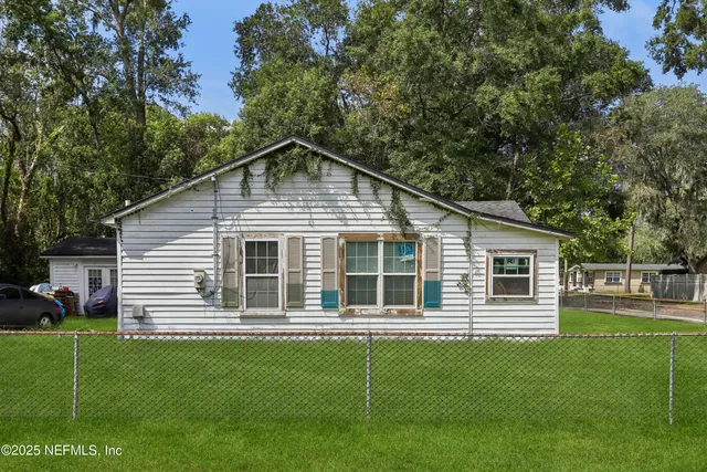 a house view with a garden space