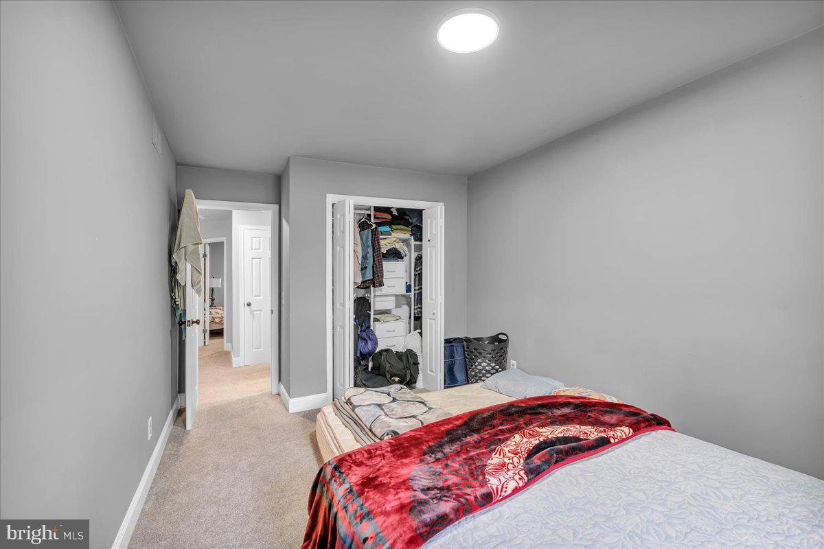 92 Ginger Drive Lumberton, NJ 08048 - Photo 14 of 19 a bedroom with a bed and a lamp