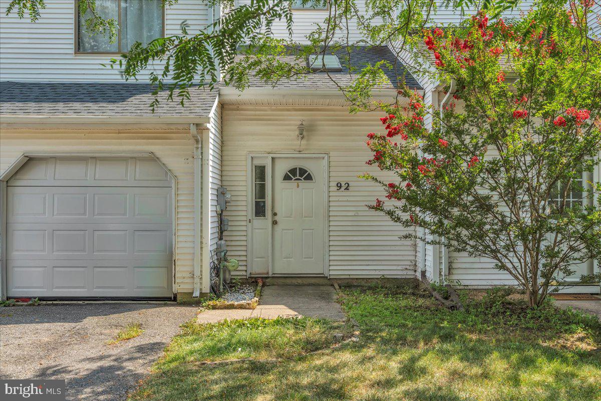 92 Ginger Drive Lumberton, NJ 08048 - Photo 2 of 19 a front view of a house with a garden