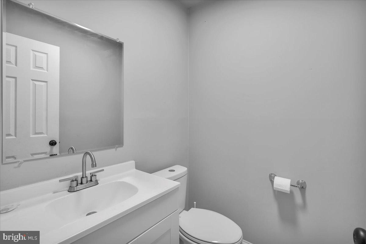 92 Ginger Drive Lumberton, NJ 08048 - Photo 10 of 19 a bathroom with a sink a toilet and mirror