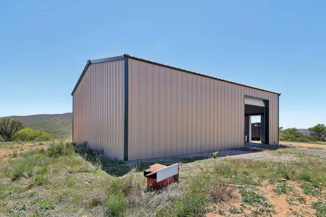 a view of a mountain range with trees