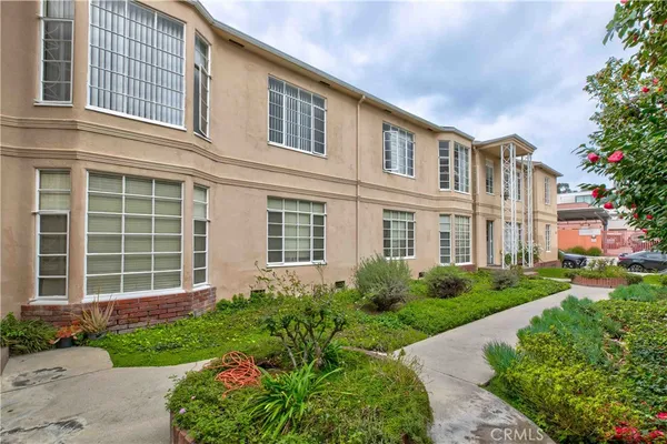 a view of parking space with parked cars