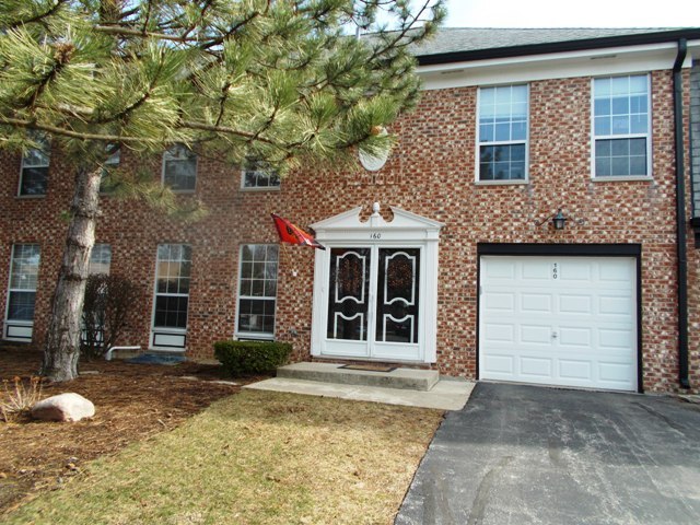 160 West Golf Road Libertyville, IL 60048 - Photo 1 of 12 a view of a house with a large tree