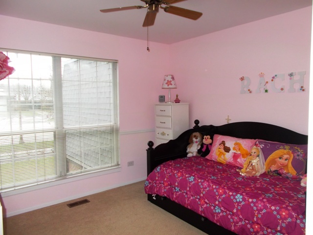 160 West Golf Road Libertyville, IL 60048 - Photo 12 of 12 a bedroom with a bed and a large window