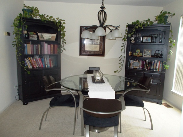 160 West Golf Road Libertyville, IL 60048 - Photo 6 of 12 a table room with a piano and wooden floor