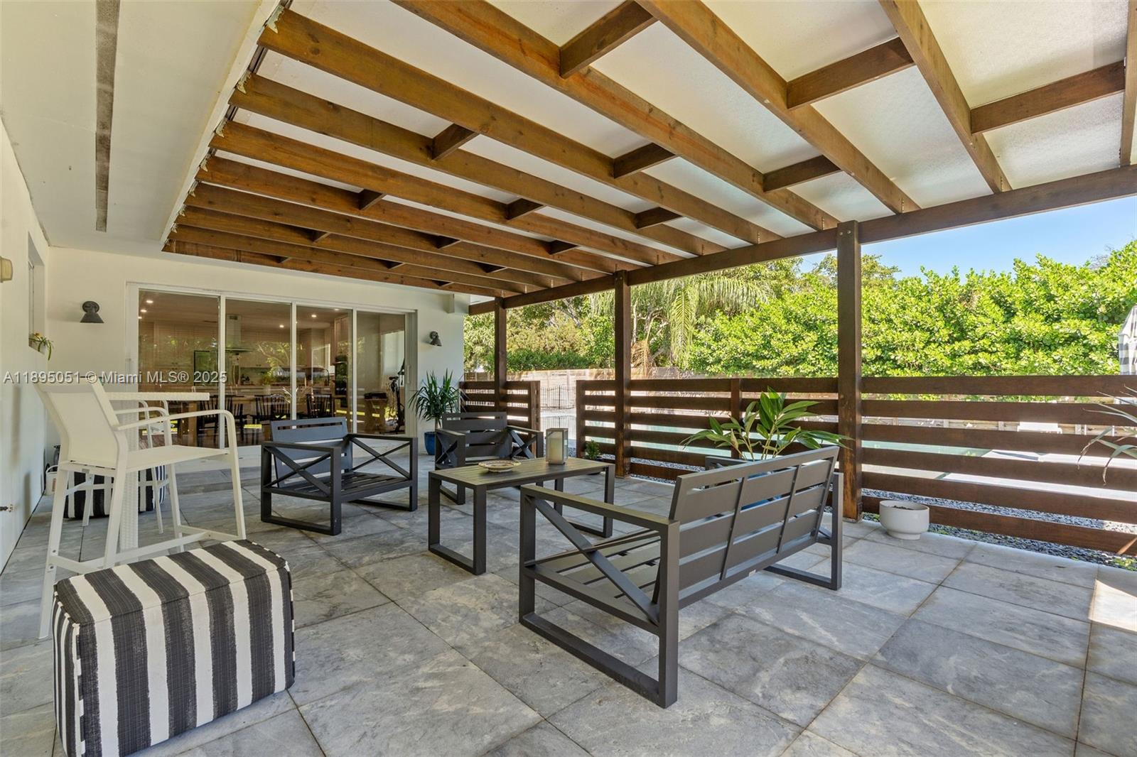 8121 Southwest 97th Terrace Miami, FL 33156 - Photo 11 of 38 a room with gym equipment and large windows