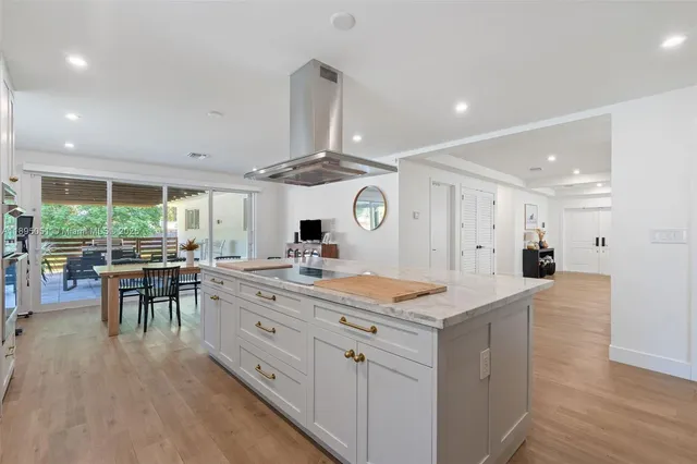 a dining room with furniture window wooden floor