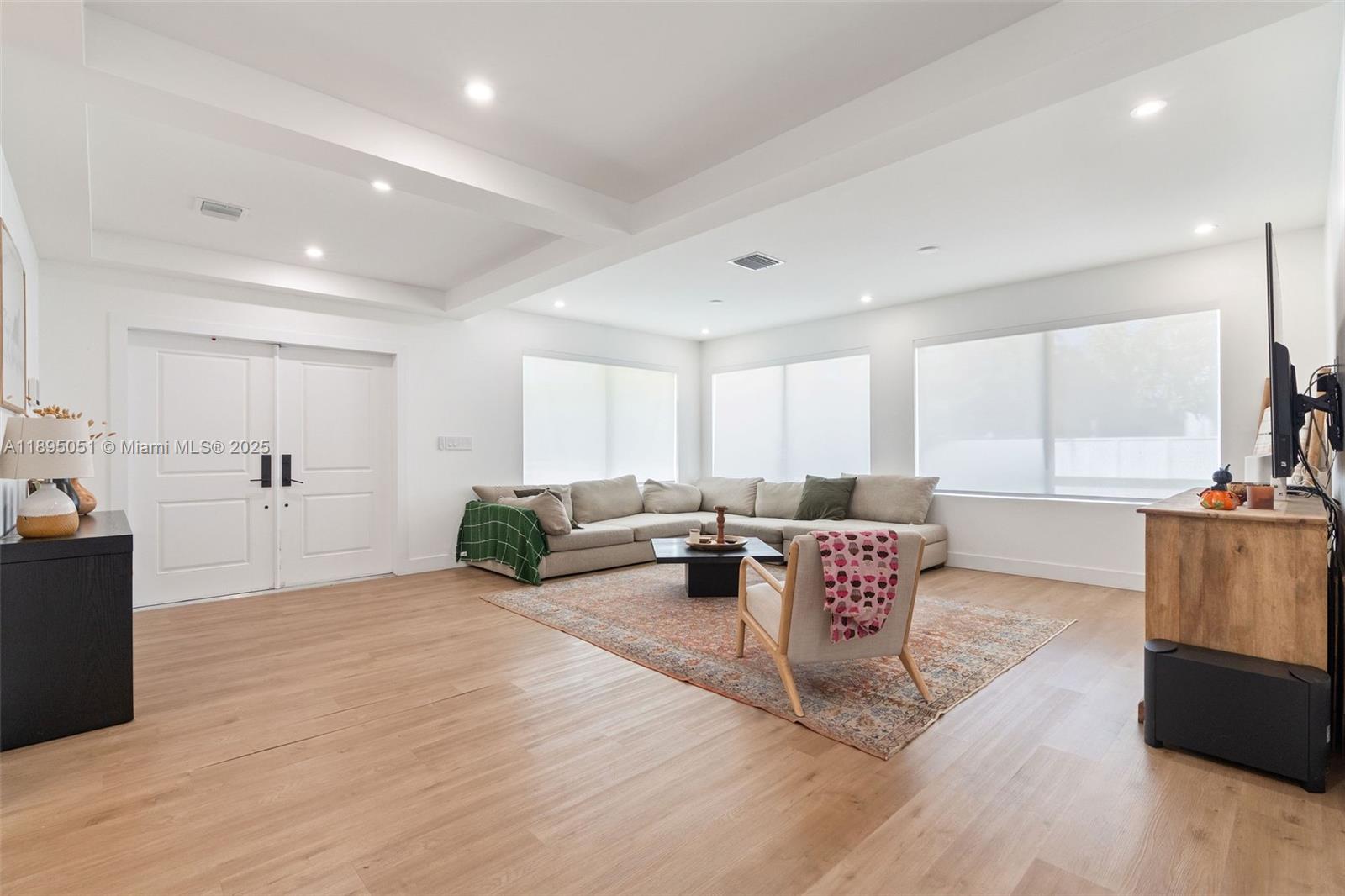 8121 Southwest 97th Terrace Miami, FL 33156 - Photo 20 of 38 a living room with furniture and a large window