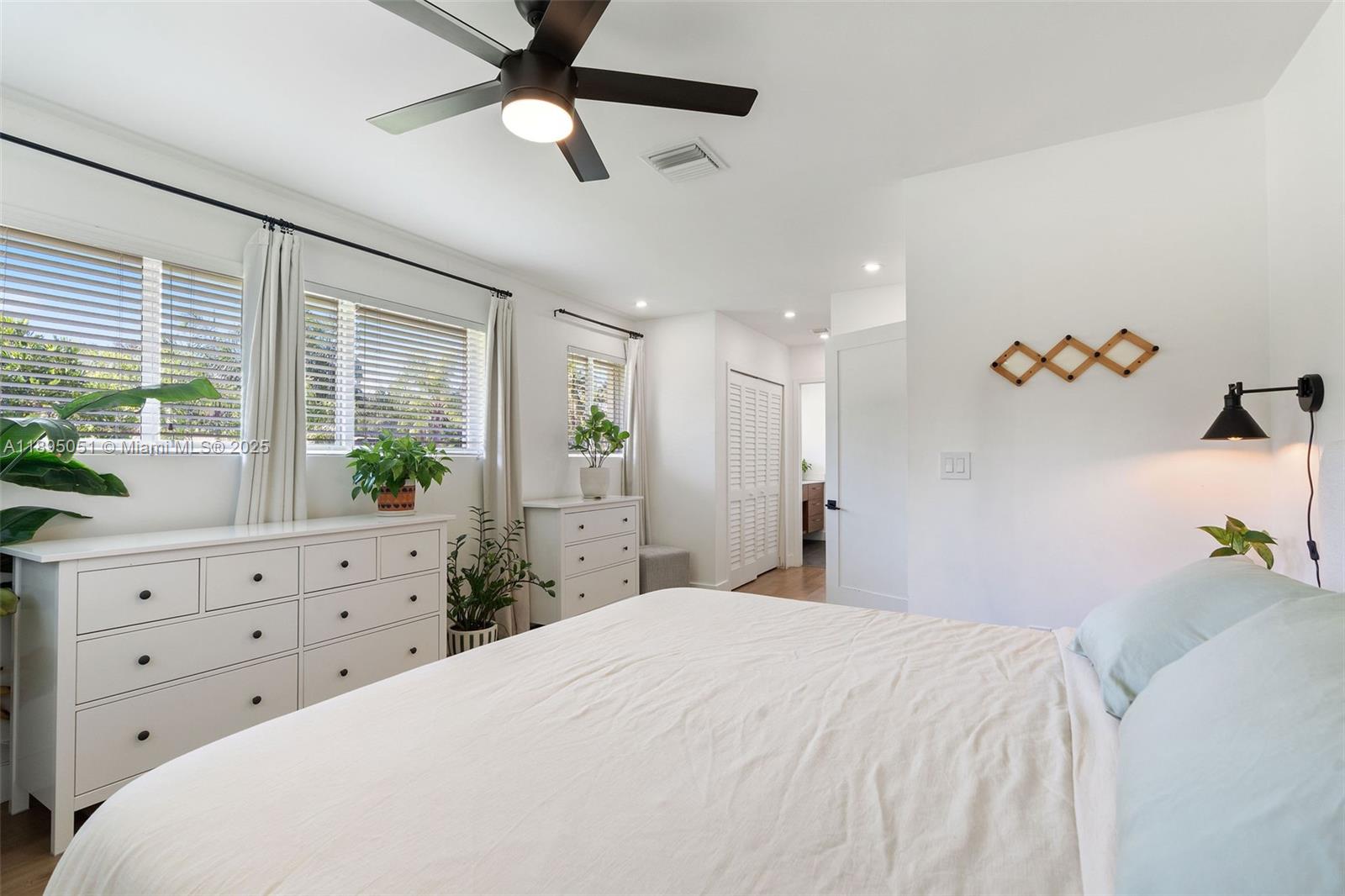 8121 Southwest 97th Terrace Miami, FL 33156 - Photo 26 of 38 a bedroom with a bed and a dresser