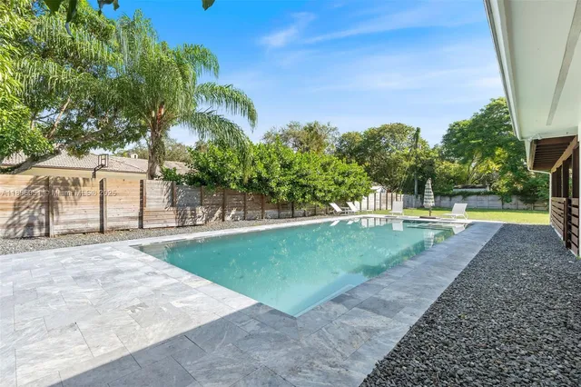 a view of a park with plants and trees